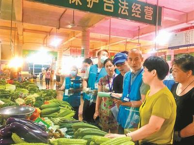 “农产品任你查”走进坪山老市场